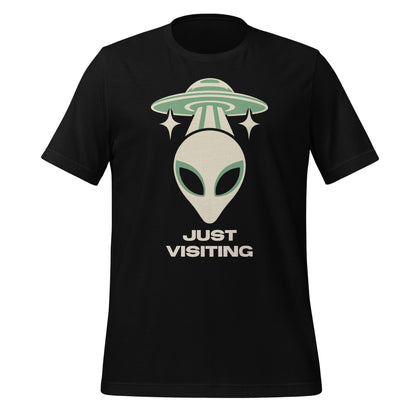 Black Nulterra T-shirt with a cream and sage green alien beneath a UFO and 'Just Visiting' lettering, front view.